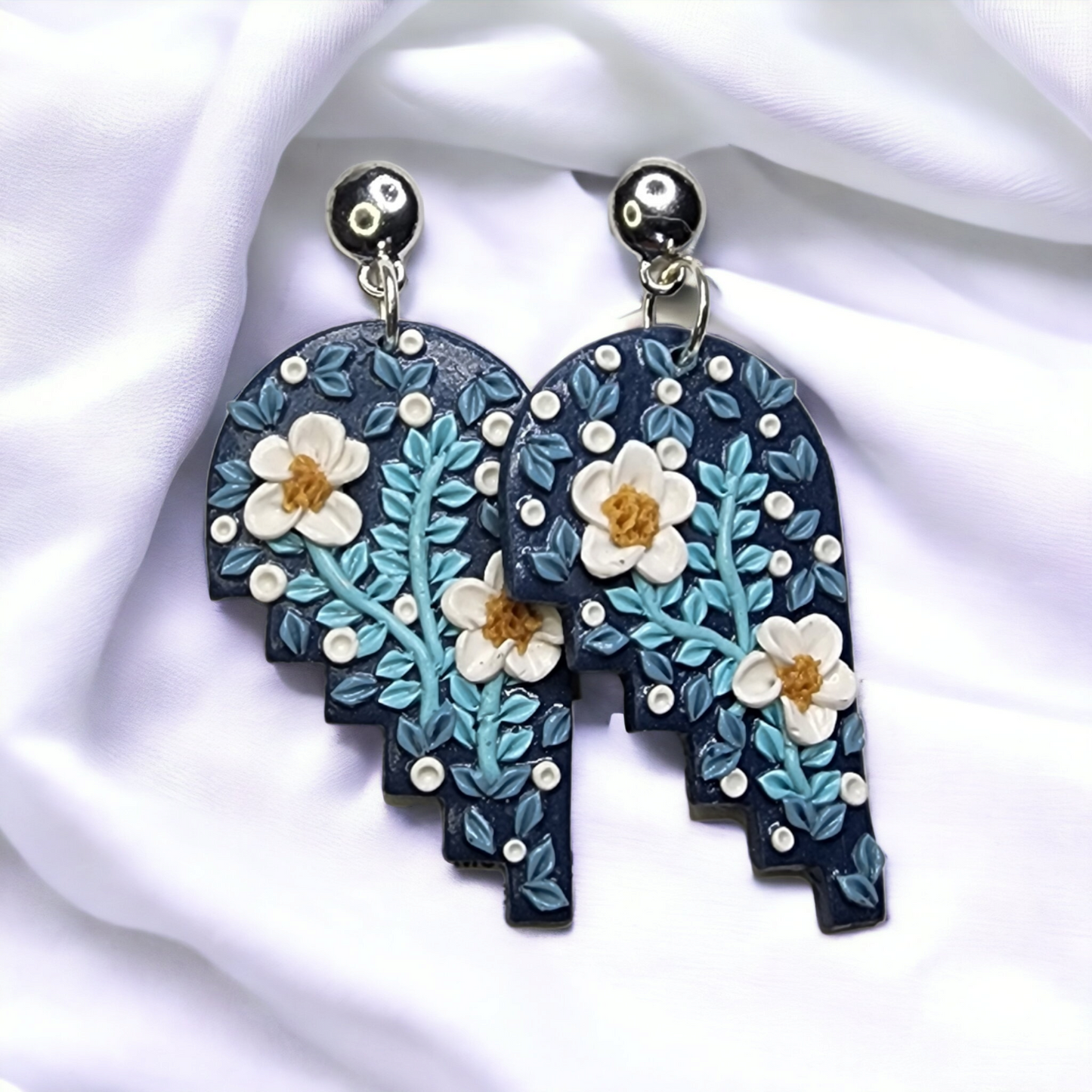 Handmade blue with white flower polymer clay earrings