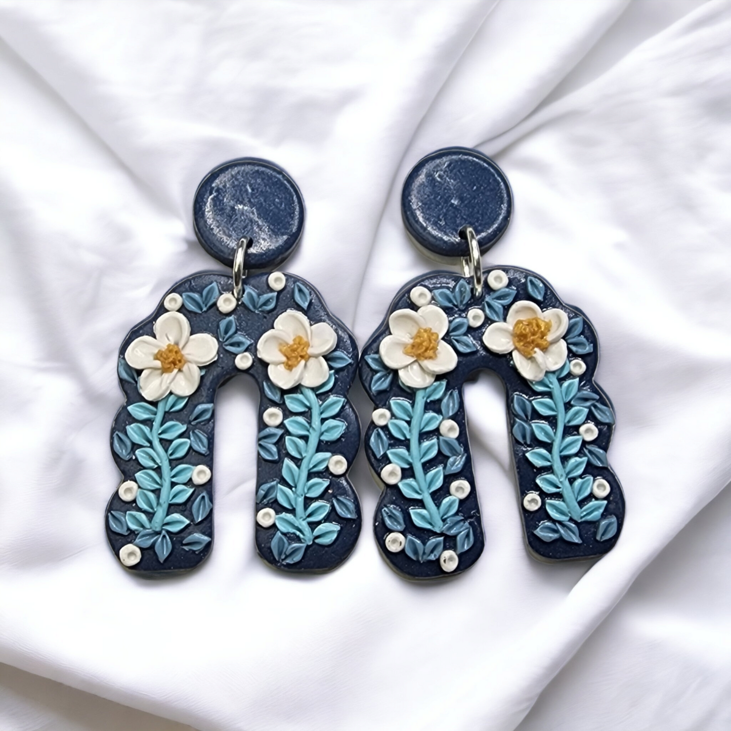 Handmade blue with white flower polymer clay earrings
