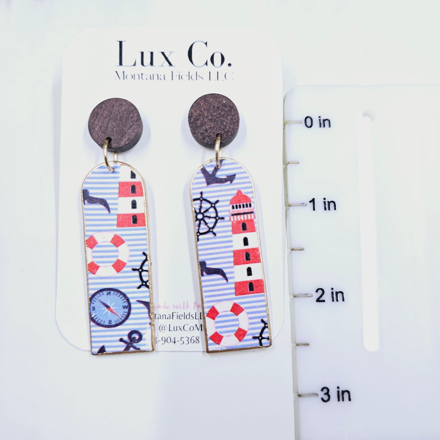 Nautical polymer clay earrings with beach themed design